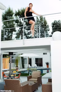 Veronica Ricci shows off her new redhead tresses while standing and posing naked on her second...