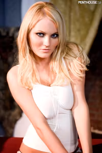 Hannah Hilton - Hannah Hilton is staying up all night waiting for her favorite man Santa to arrive. This year she's been extra naughty but she doesn't think St. Nick'll mind because she's got more than just cookies and milk ready for the big guy!